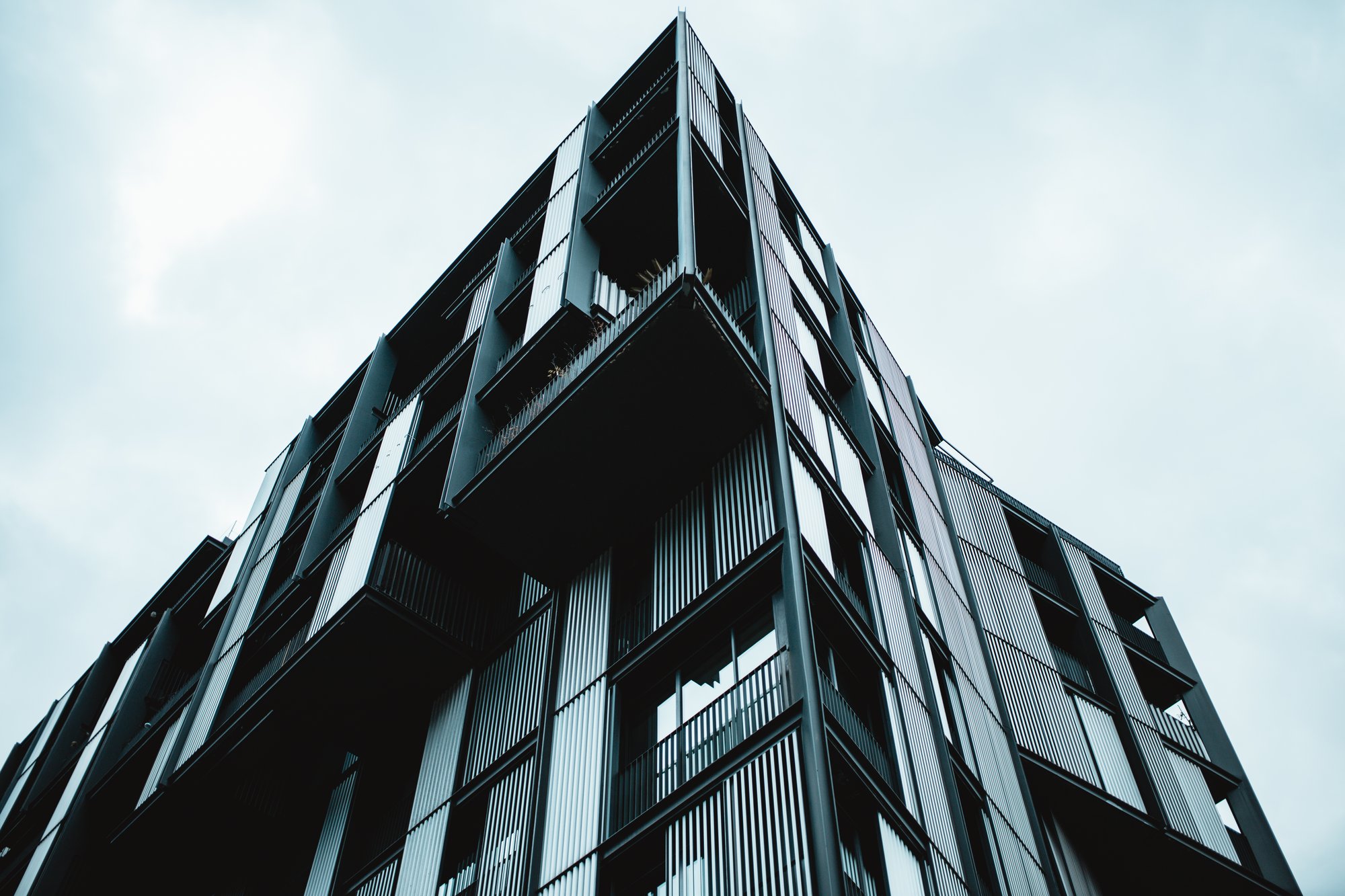 low-angle-shot-modern-building-with-glass-windows